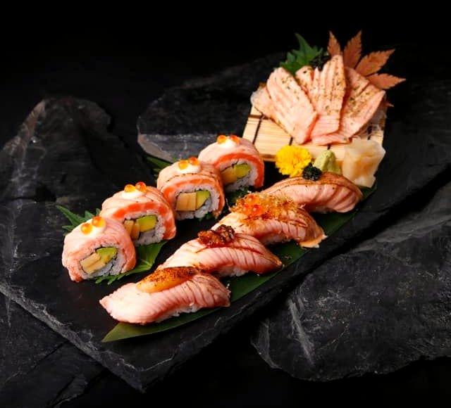 Sushi platter on black stone